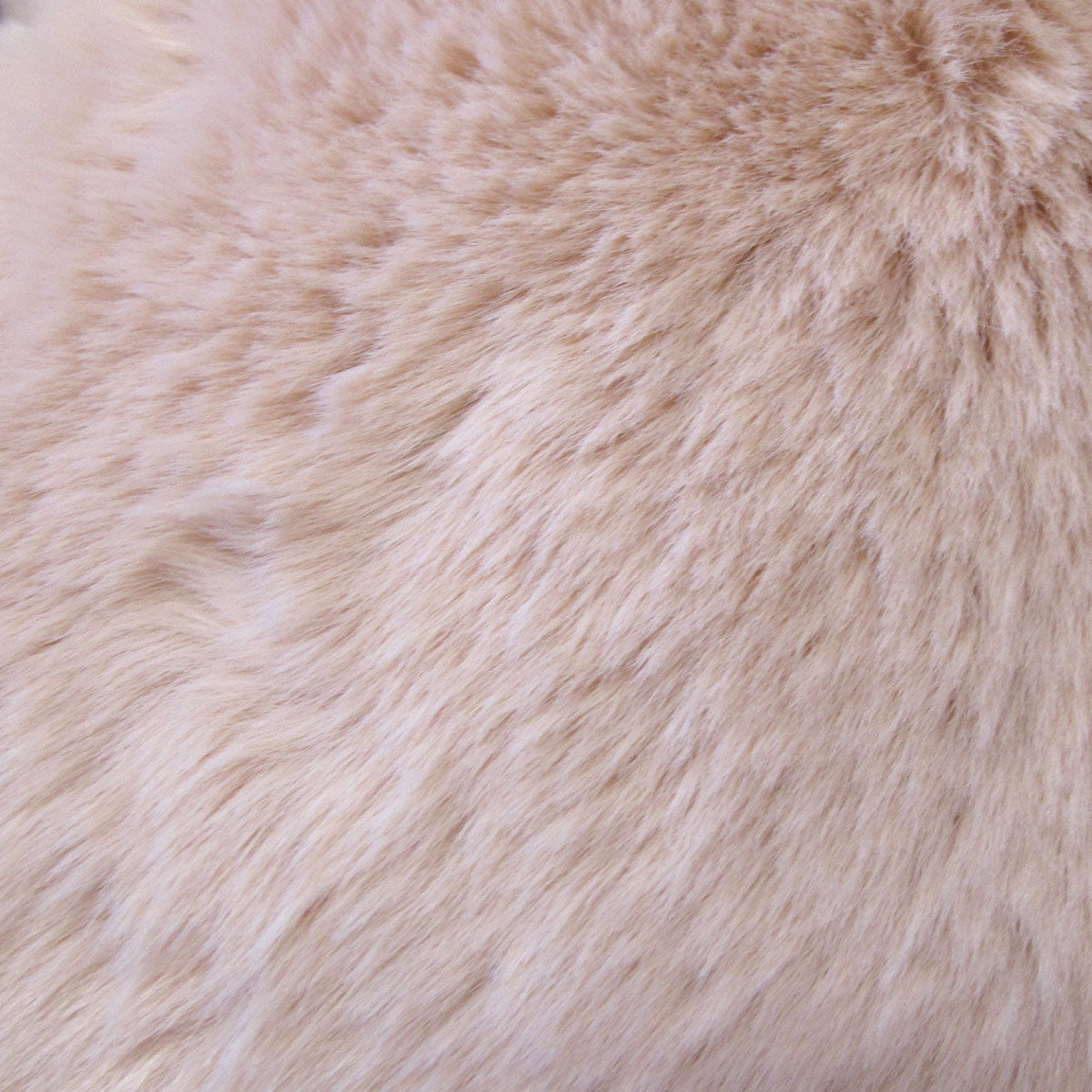 Close-up of soft texture on Ariana Long Fleece Faux Fur Throw Rug Pink showing luxurious plush fibers and warmth for bedroom decor.
