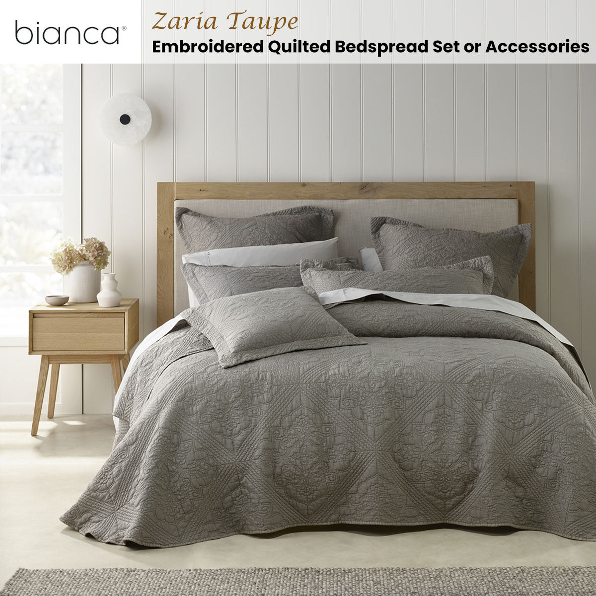 Bianca Zaria Taupe Embroidered Bedspread Set King on wooden bed frame with pillows in minimalist bedroom setting