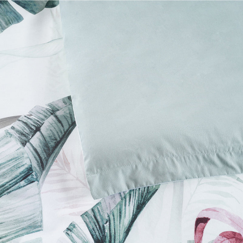 Close-up of Bianca Abbey Green Cotton Sateen Tropical Floral Quilt Cover Set Queen with botanical print on soft fabric