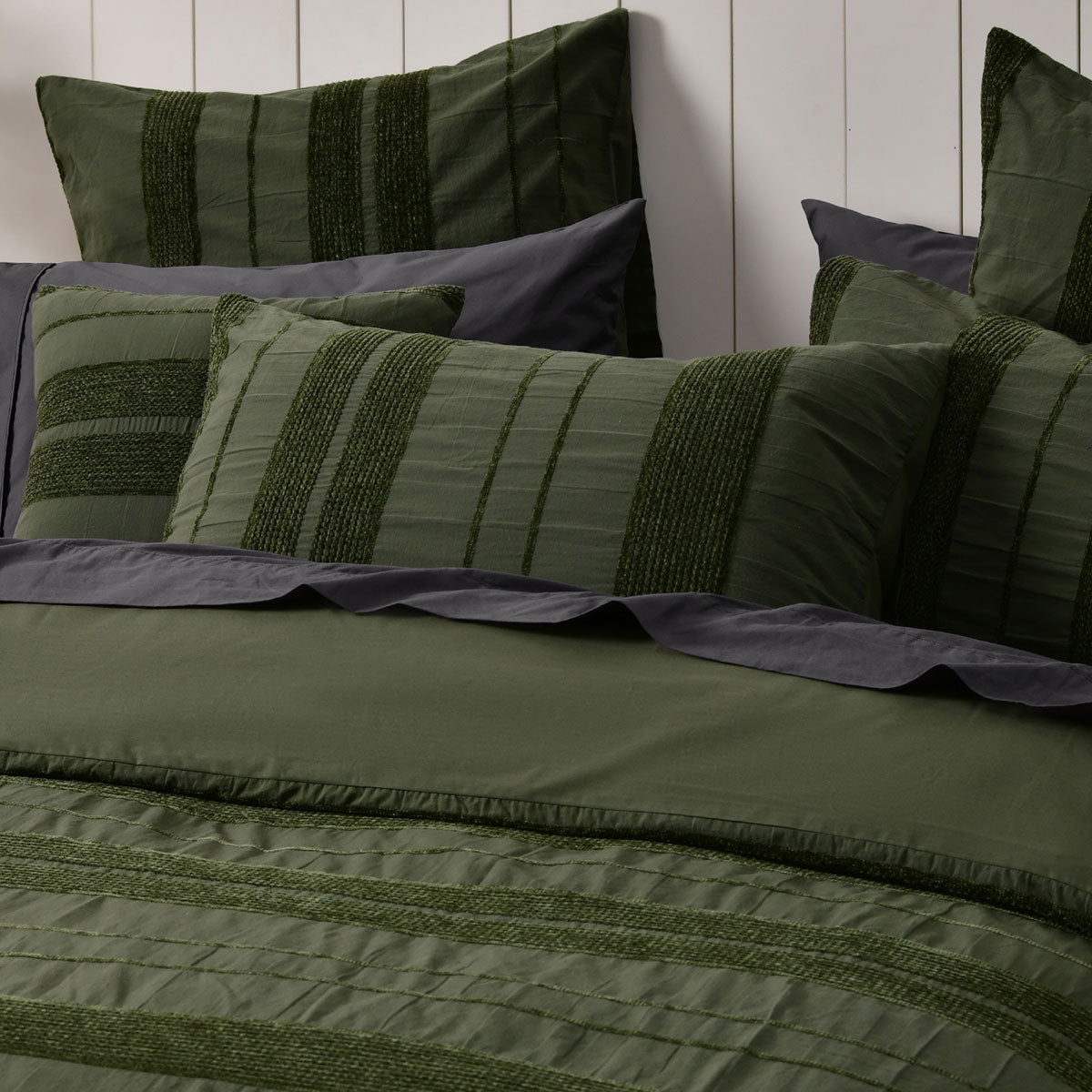 Bianca Avery Forest Chenille Striped Quilt Cover Set Super King in forest green with textured chenille stripes on bed by Bedzy