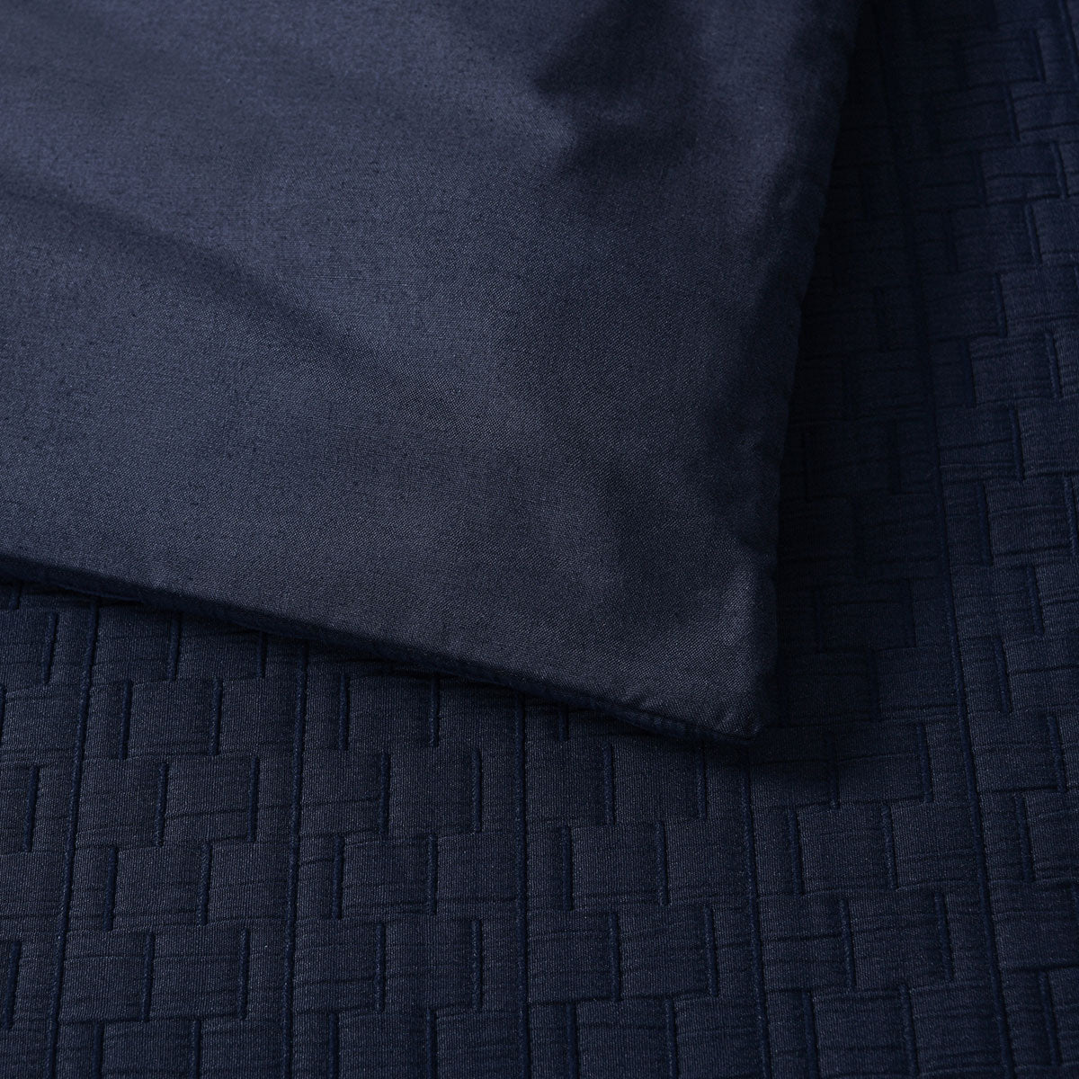 Close-up of Bianca Burleigh Ink Jacquard Quilt Cover Set King in ink color with textured jacquard pattern and soft fabric