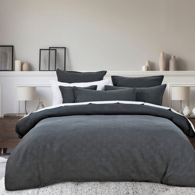 Bianca Hallston Charcoal Pre-Washed Cotton Quilt Cover Set King on bed with matching cushions in stylish bedroom setting