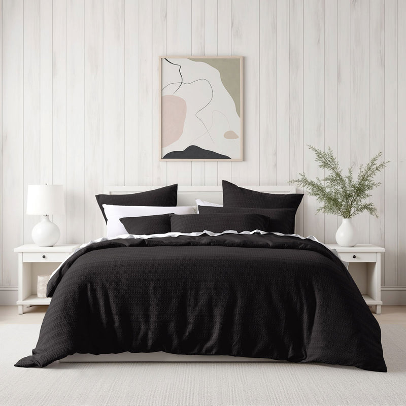 Bianca Kahlani Chocolate Waffle Quilt Cover Set King on bed with white pillows, bedside tables, lamps, and wall art in bedroom