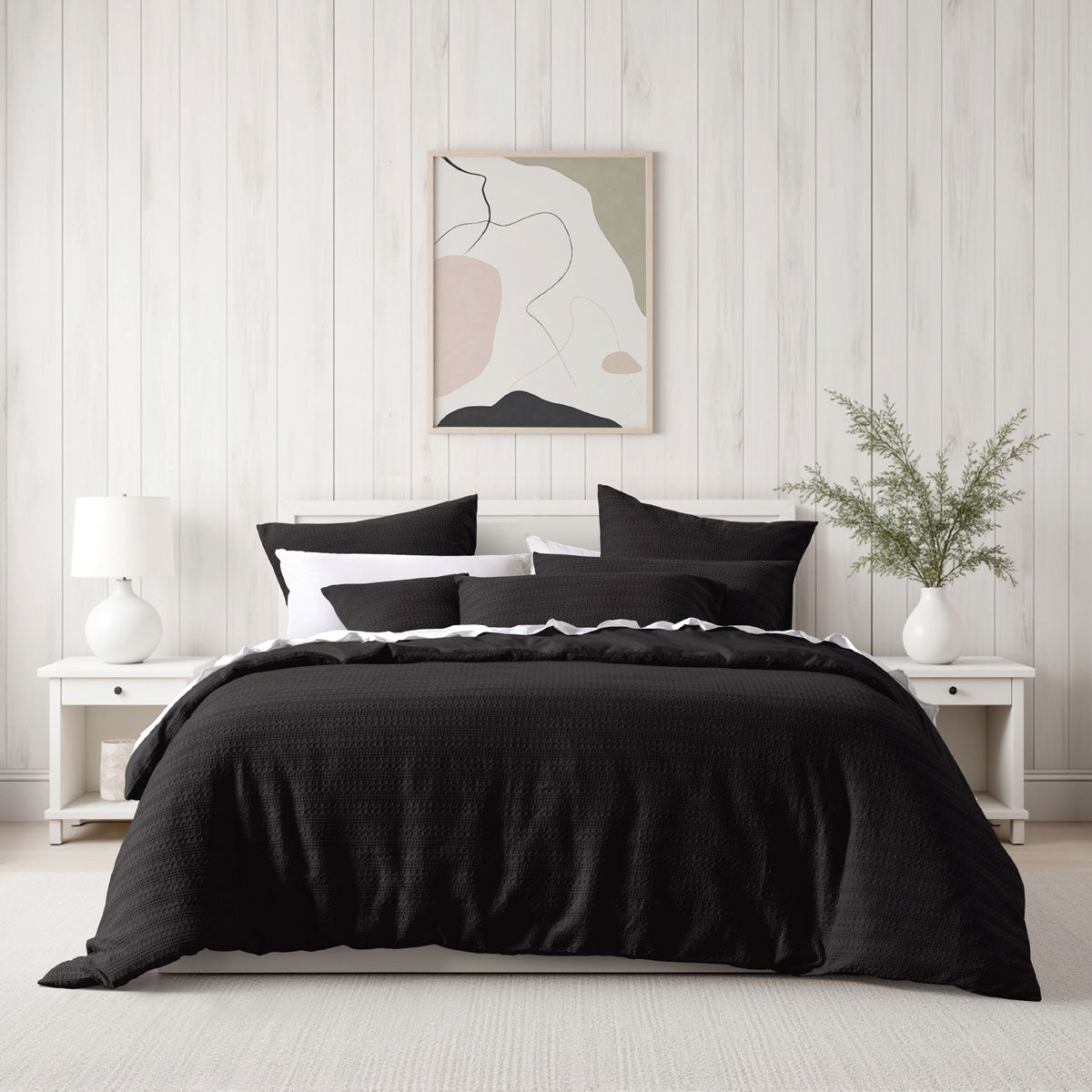 Bianca Kahlani Chocolate Waffle Quilt Cover Set Super King in black waffle fabric styled on bed with pillows and bedside tables