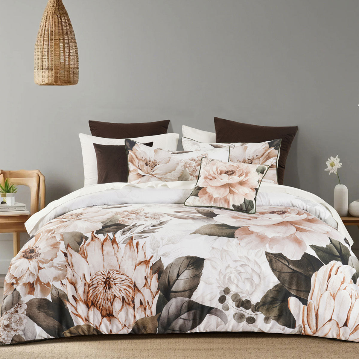 Bianca Somerset White Cotton Sateen Floral Quilt Cover Set Queen on bed with autumn floral design and brown cushions
