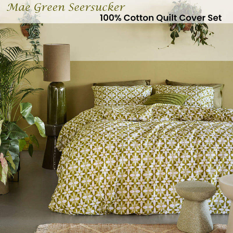 Bedding House Mae Green Seersucker Cotton Quilt Cover Set King on bed with green pillows and earthy bedroom decor