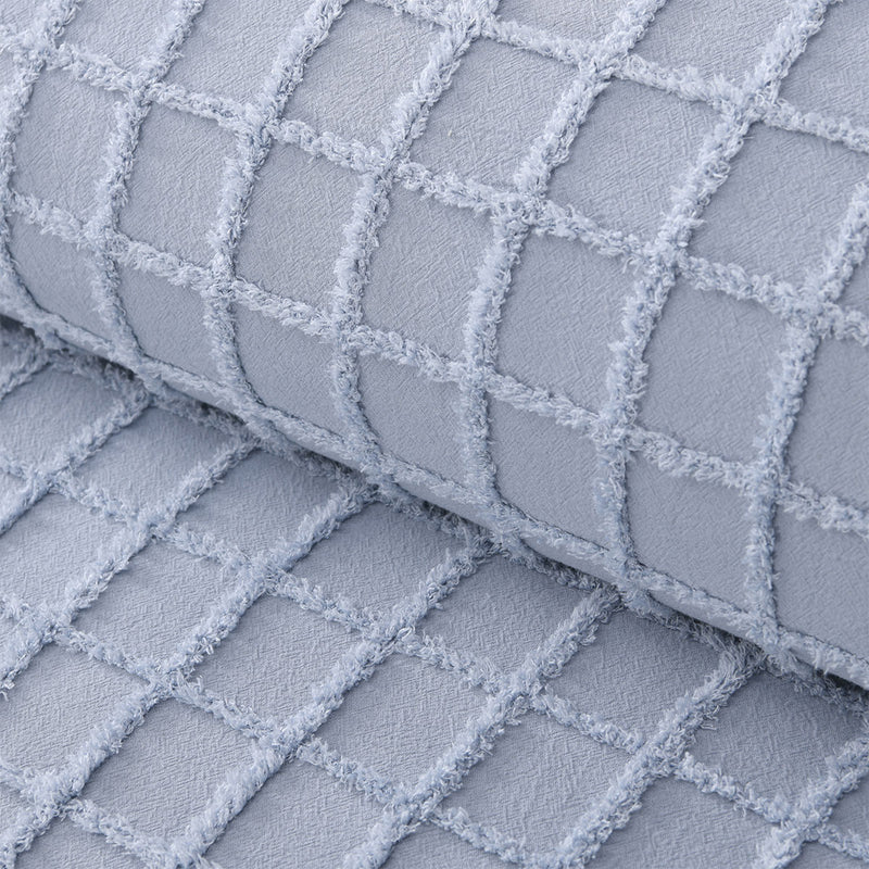 Close-up of textured blue cotton fabric from Vintage Design Homewares Parquet Snooze Blue Cotton Quilt Cover Set King