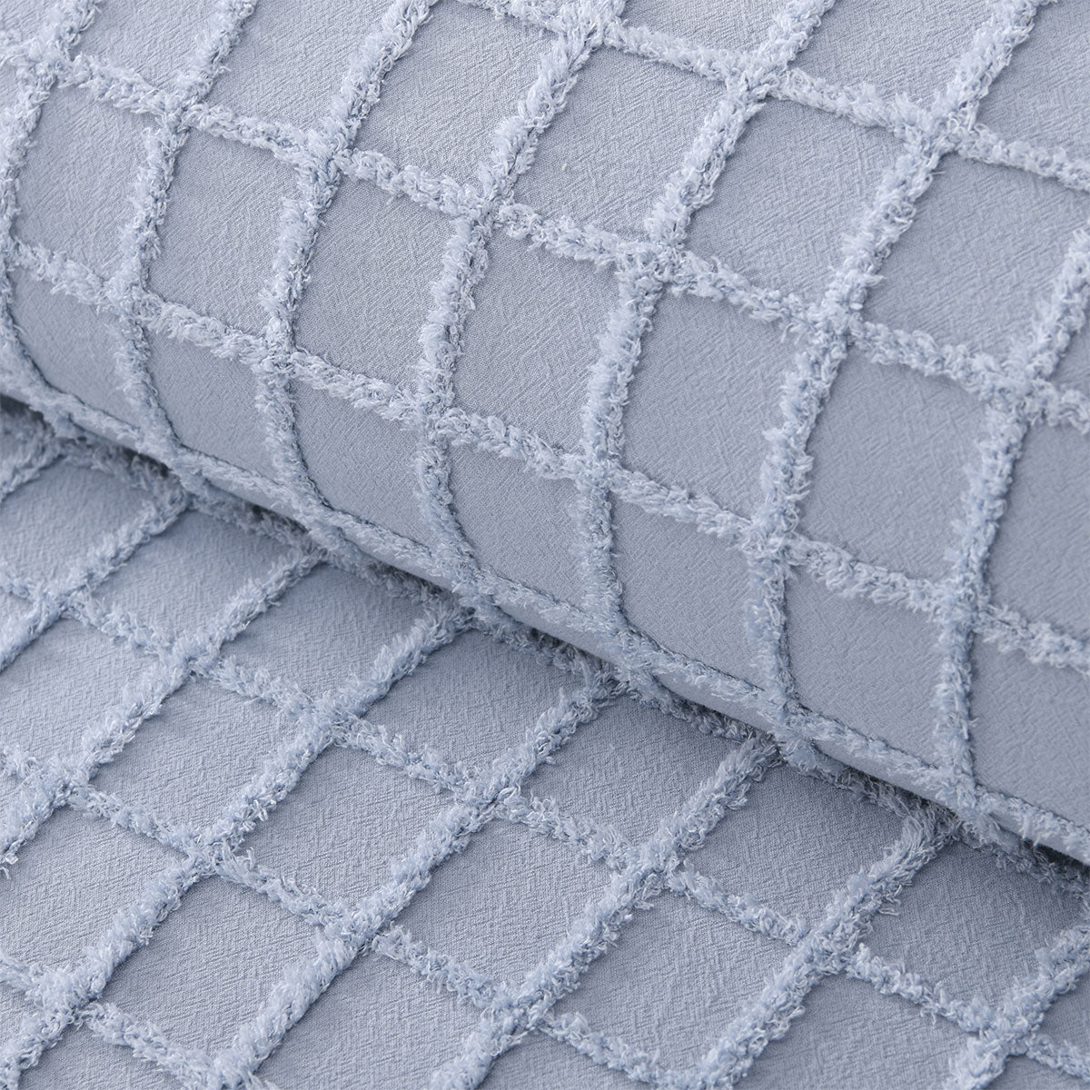 Close-up of textured blue cotton fabric in Vintage Design Homewares Parquet Snooze Blue Cotton Quilt Cover Set Queen