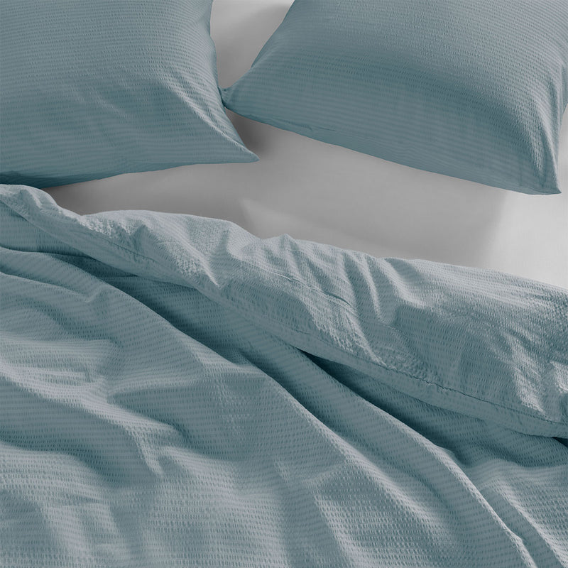 Bedding House Summer Blue Grey Seersucker Cotton Quilt Cover Set King with textured fabric and matching pillowcases on bed