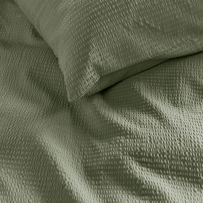 Bedding House Summer Green Seersucker Cotton Quilt Cover Set King in textured light green, shown on bed with matching pillowcase