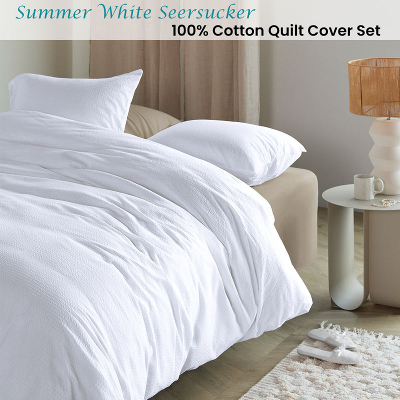 Bedding House Summer White Seersucker Cotton Quilt Cover Set King on bed with pillows and bedside table in bedroom