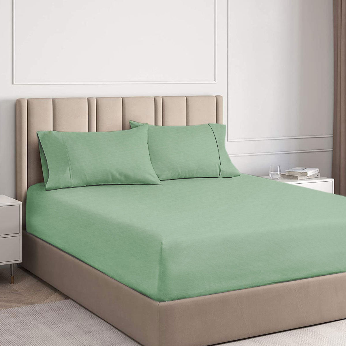 Avocado 2000TC Cooling Bamboo Combo Set King in green fitted sheet and pillowcases on beige upholstered bed frame