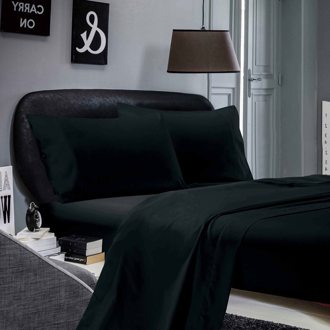 1000TC Ultra Soft Double Size Bed Black Flat & Fitted Sheet Set on modern bed in stylish bedroom setting with bedside lamp