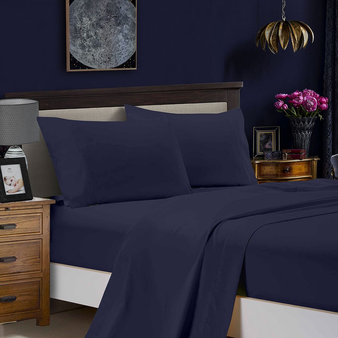 1000TC Ultra Soft Double Size Bed Midnight Blue Flat & Fitted Sheet Set on bed with wooden frame and bedside tables