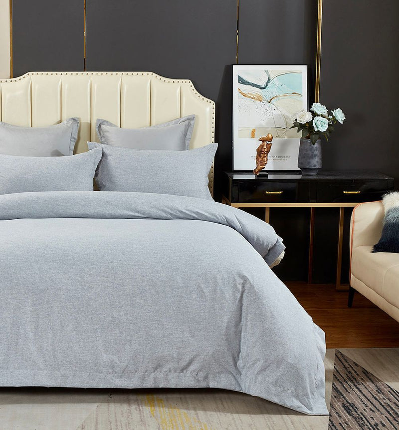 Tailored Super Soft Quilt Cover Set - Queen Size in light gray, styled on bed with neutral headboard and modern décor.