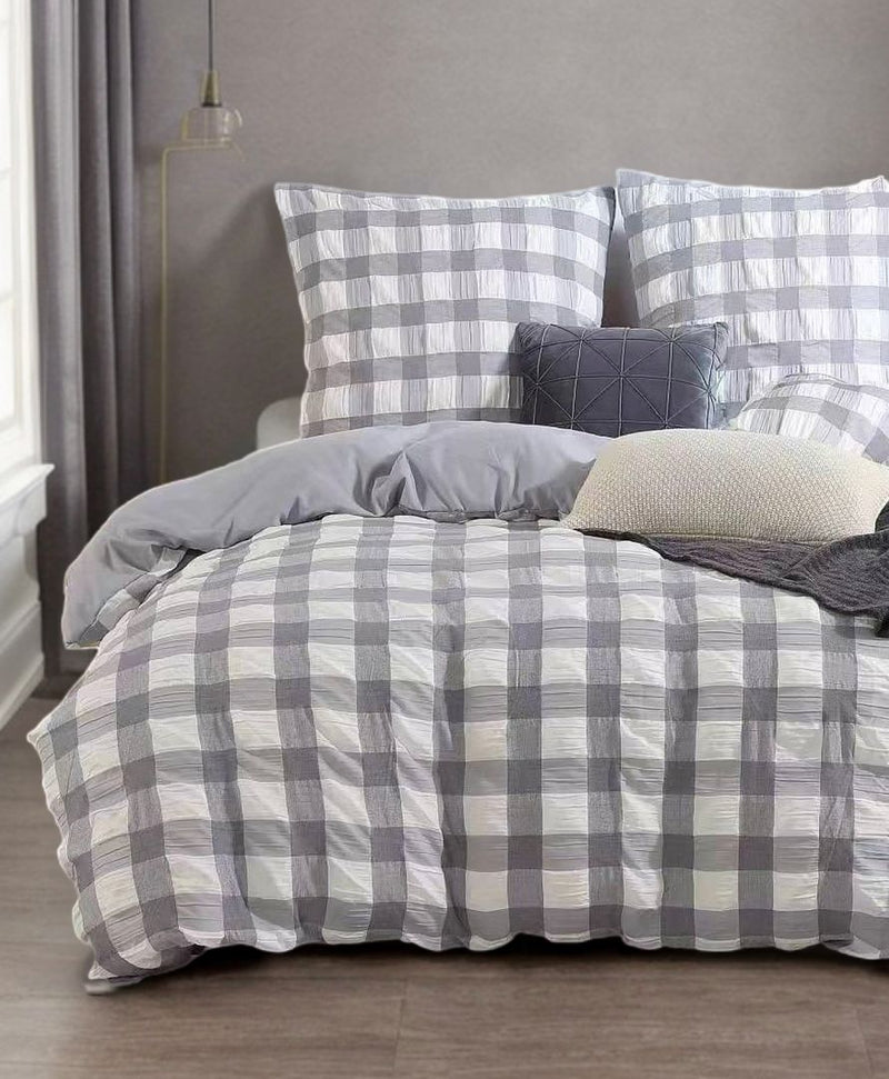 Rylee Grey Check Seersucker Quilt Cover Set - Queen Size on a bed with pillows in a modern bedroom setting