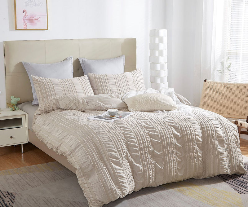 King size beige tufted boho striped embroidery quilt/doona/duvet cover set on styled bed in bedroom setting