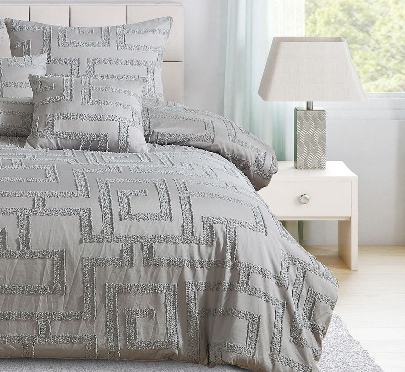 Tufted Jacquard Quilt/Doona/Duvet Cover Set - Grey - Super King Size displayed on bed with decorative pillows and bedside table lamp