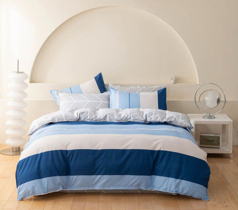 Mannix Striped Quilt Cover Set - King Size on bed with modern white bedside table and decor in bedroom setting