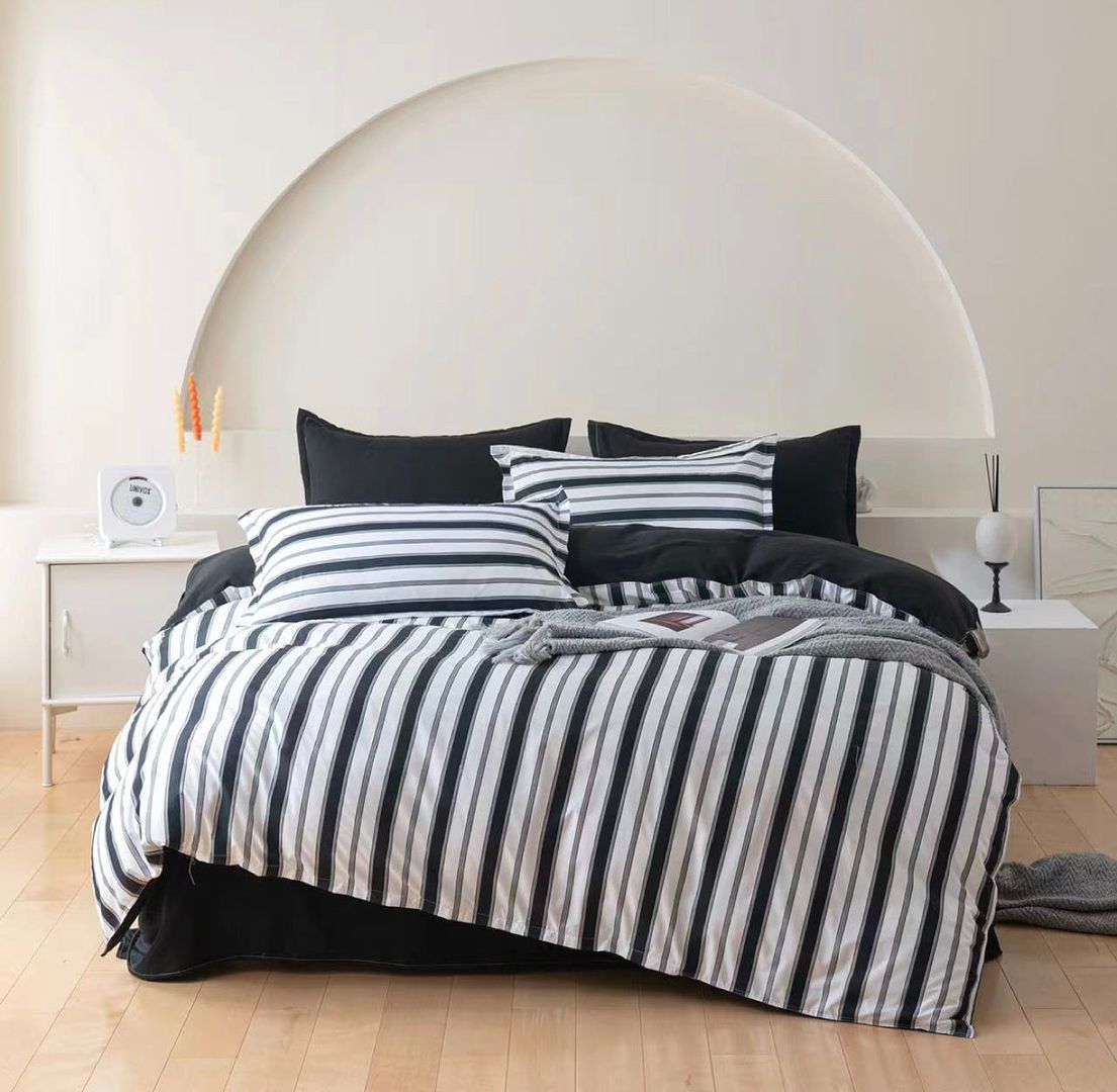 Ascar Striped Quilt Cover Set - Queen Size with black and white stripes, styled on bed with black pillows in modern bedroom setting