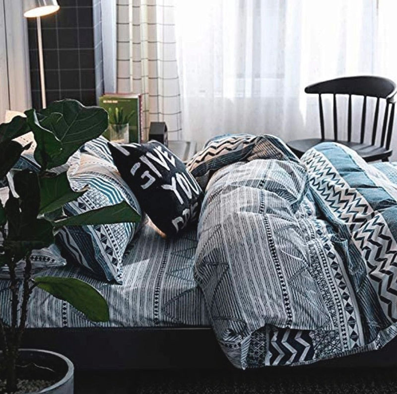 Dennings Super King Size Quilt/Doona/Duvet Cover Set with blue and black geometric patterns styled in modern bedroom setting