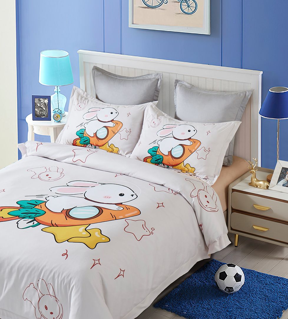 Rabbit Kids Quilt Cover Set - Double Size with cute bunny and carrot print on white bedding in a kids bedroom setting