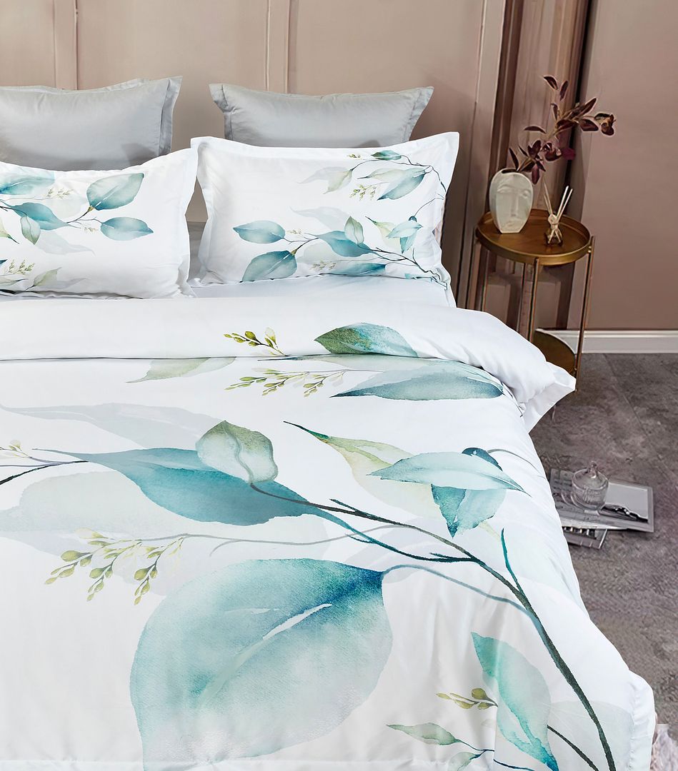 Angelis Leaves Quilt Cover Set - King Size with botanical print on white bedding in modern bedroom setting