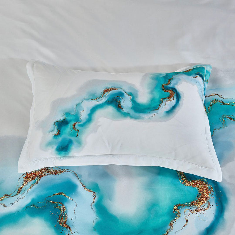 Ocean Marble Quilt Cover Set - King Size with blue and gold marble pattern on pillow and duvet in bedroom setting