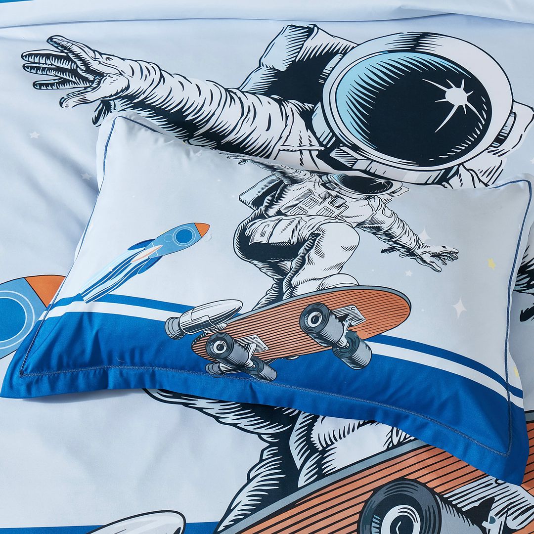 Astronaut Kids Quilt Cover Set - King Single Size with astronaut skateboarding design on pillow and quilt cover by Bedzy