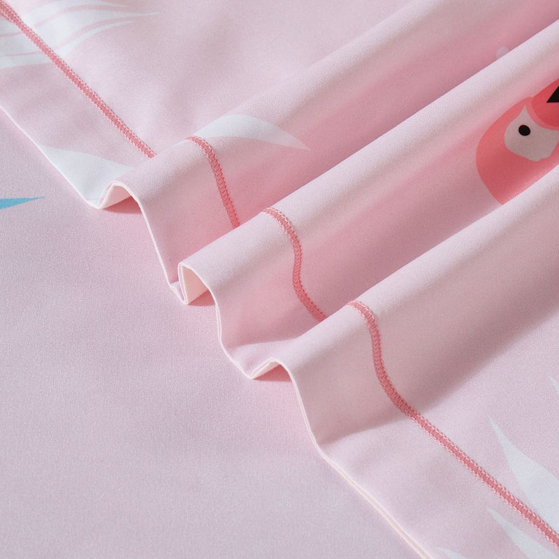 Close-up of soft pink fabric with flamingo print and stitching detail from Flamingo Kids Quilt Cover Set - King Single Size