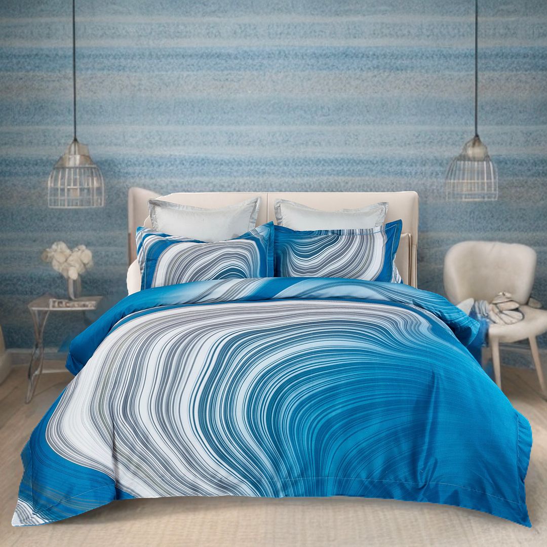 Evienne Quilt Cover Set - Queen Size with blue and white swirling pattern on bed in modern bedroom setting