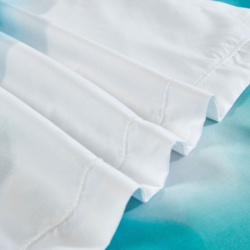 Ocean Marble Quilt Cover Set - Queen Size with smooth white fabric layered over blue-green marble bedding by Bedzy