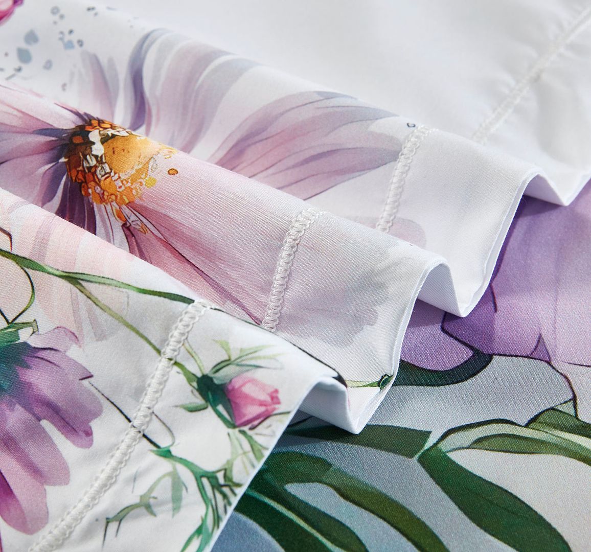 Close-up of Marrea Floral Quilt Cover Set - Queen Size showing floral print and detailed stitching on soft fabric