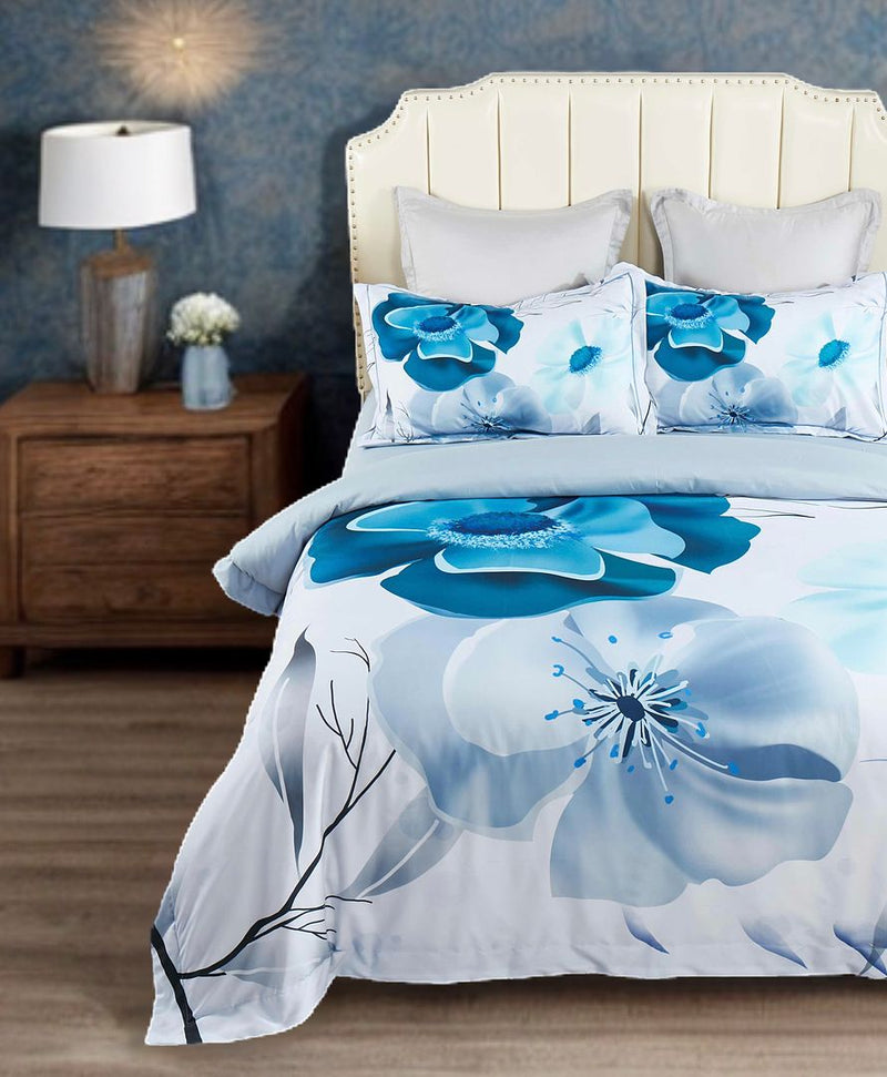 Julieta Floral Quilt Cover Set - Queen Size with large blue floral pattern on bed in modern bedroom setting