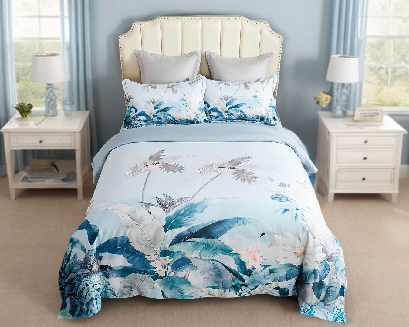 Tropical Quilt Cover Set - Queen Size with blue and white botanical design on bed with cream headboard and bedside tables