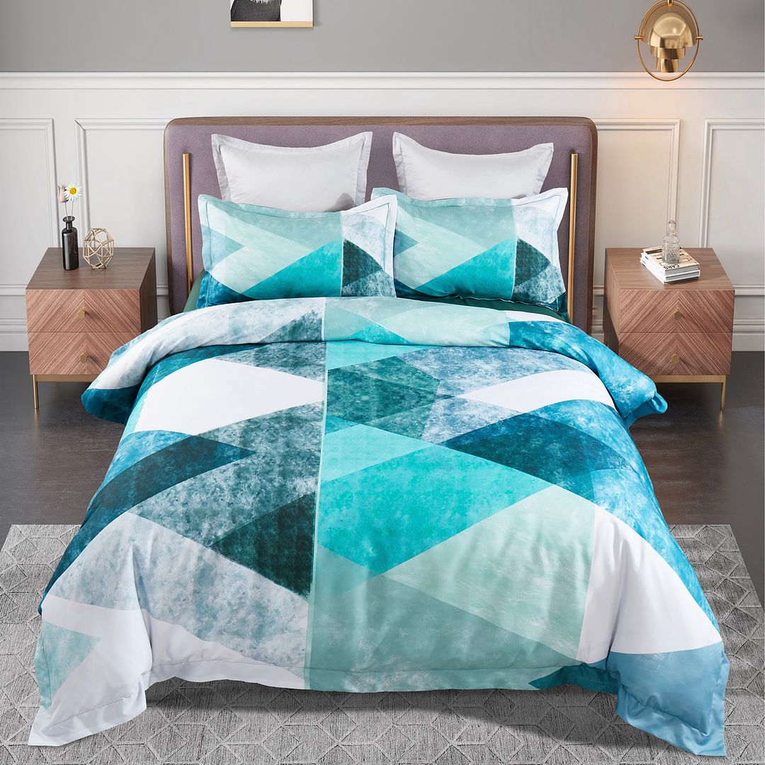 Takashi Quilt Cover Set - Queen Size with geometric teal, blue, and white pattern on bed with modern bedroom furniture