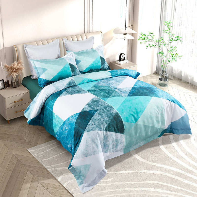 Takashi Quilt Cover Set - Queen Size with geometric blue and teal design on a bed in a modern bedroom setting