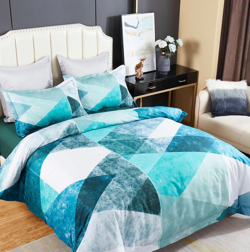 Takashi Quilt Cover Set - Super King Size in teal geometric pattern on bed with padded headboard in cozy bedroom setting