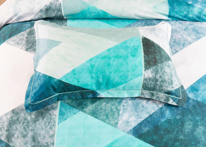 Takashi Quilt Cover Set - Super King Size in geometric teal and gray pattern on pillow and quilt cover.