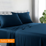 1200tc hotel quality cotton rich sheet set double sailor blue on bed with matching pillowcases in modern bedroom setting
