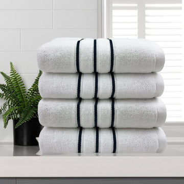 amor classic dobby stripe super soft premium cotton hand towel 4 pcs white stacked with black stripes on white surface