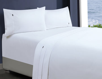 1000tc egyptian cotton 1 fitted sheet and 2 pillowcases double white on bed with smooth, crisp finish in bedroom setting