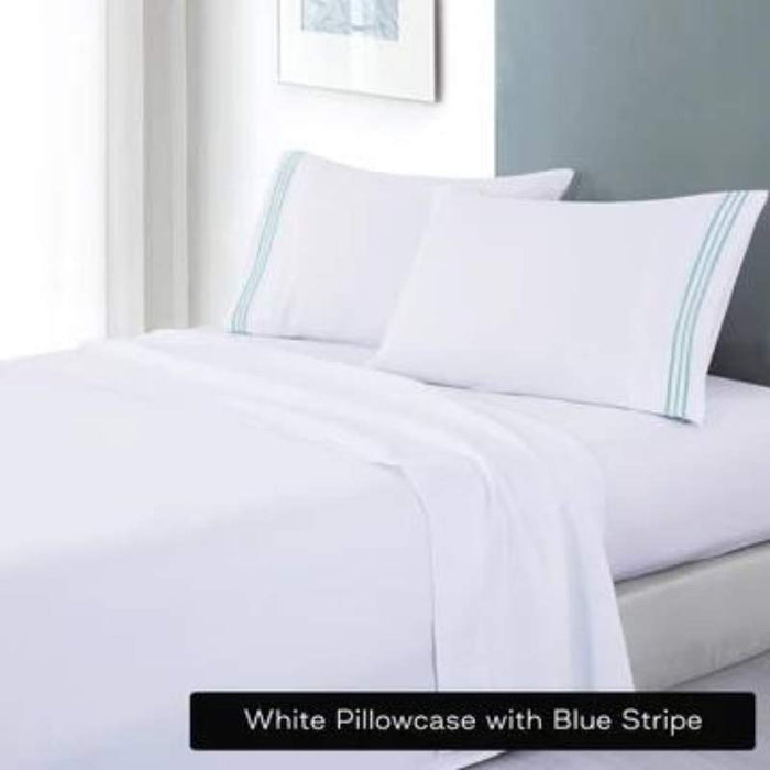 white soft microfibre sheet set with colourful embroidered stripe queen taupe stripe on bed with blue striped pillowcases