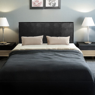 Double Size | PU Leather Bed Headboard Bedhead (Black) in a modern bedroom with bedside tables and lamps.