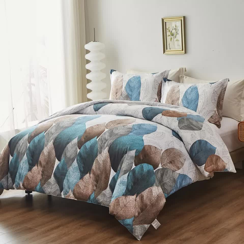 Classic White Duvet Cover Set - Hotel-Quality Finish-King with blue and brown leaf pattern on bed in bedroom setting