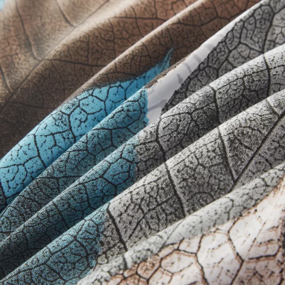 Close-up of fabric texture and leaf pattern on Classic White Duvet Cover Set - Hotel-Quality Finish-Queen by Bedzy