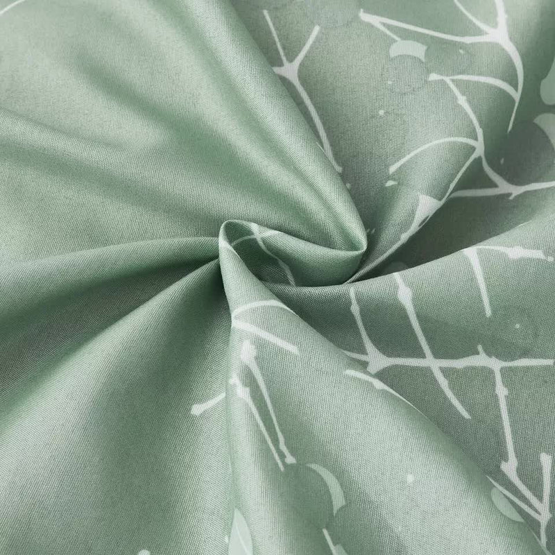 Close-up of soft green fabric with white abstract pattern from Artistic Vibes Abstract Duvet Cover Set - Easy Maintenance-King