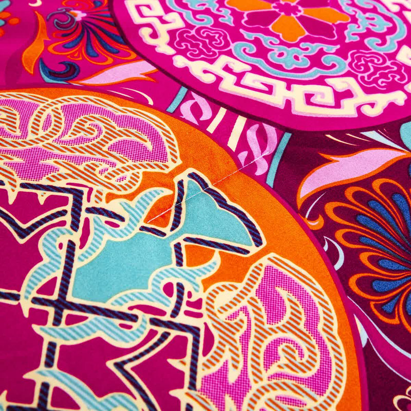 Close-up of vibrant patterned fabric from the Aesthetic Glow Floral 3‑Piece Comforter Set with Matching Shams by Bedzy
