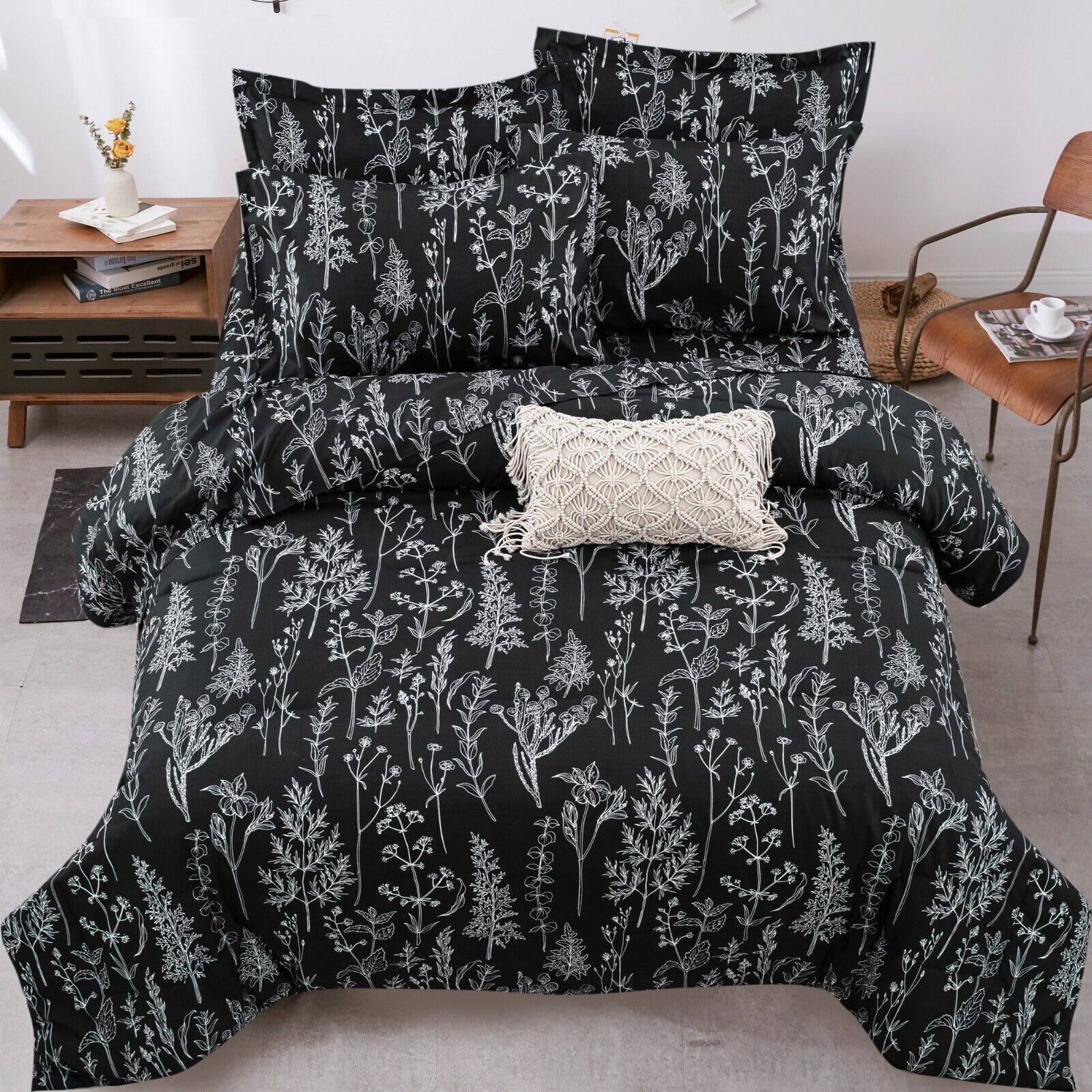 Floral Leaves Comforter Set, King Size, Microfiber Quilted Bedding with Pillowcase in black with white botanical print on bed.