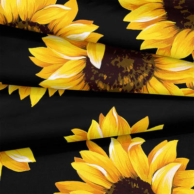 Close-up of vibrant yellow sunflowers on black fabric for the Scandi Dream soft floral Comforter Set – Soft Neutral 3‑Piece Look